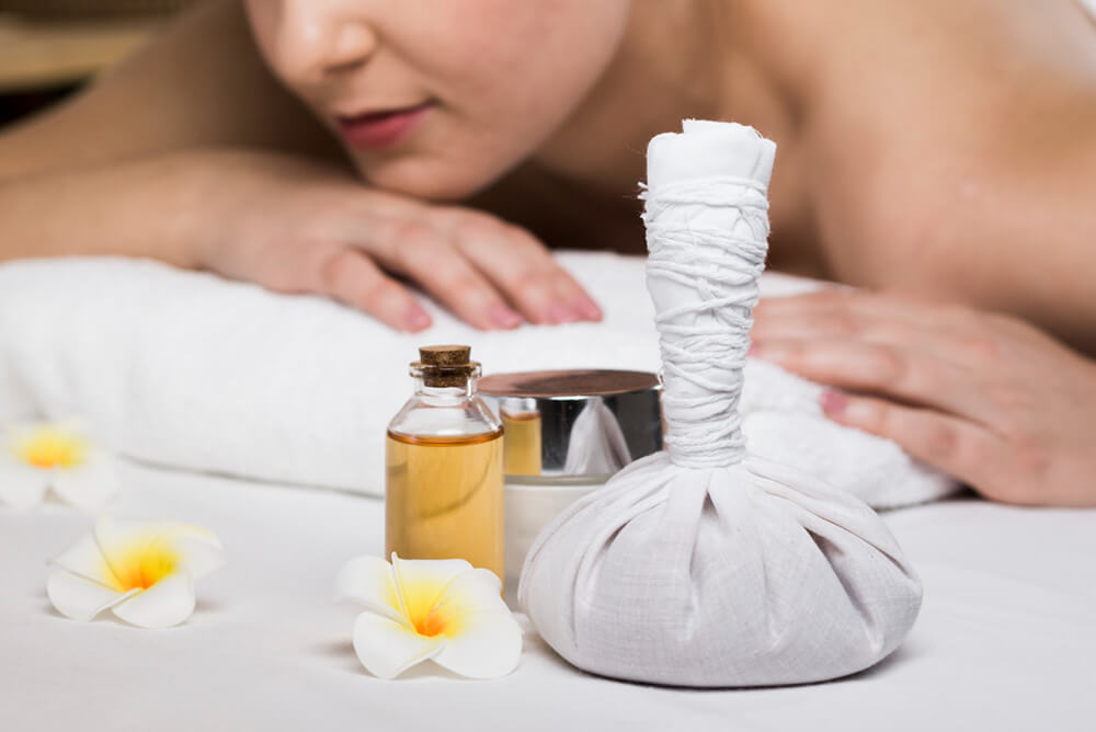 Woman receiving Aromatherapy massage
